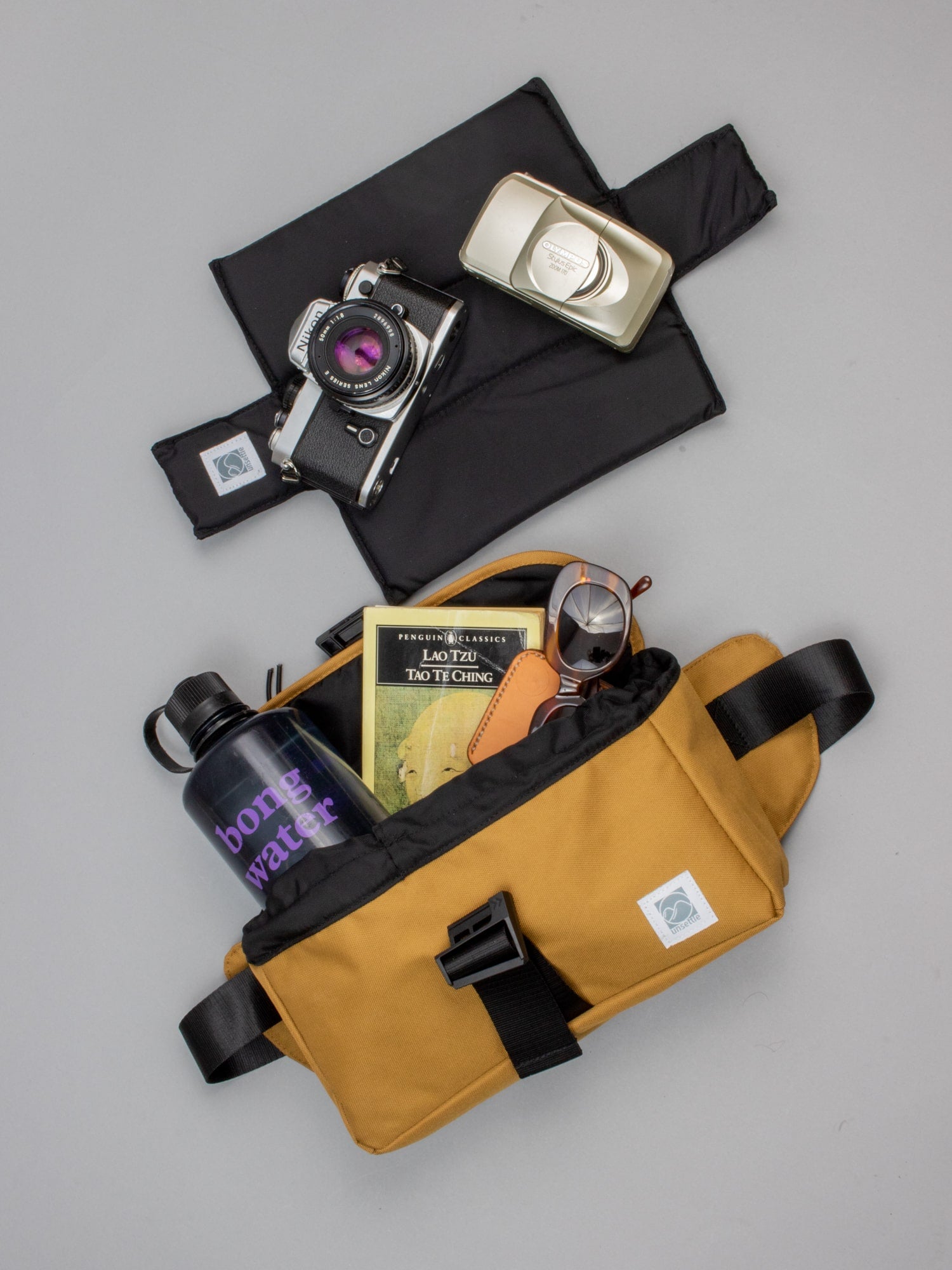 All-In-One Waterproof Camera Sling Bag and Bike Handlebar Bag | Desert –  Unsettle